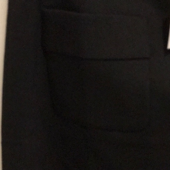 New with tags black skirt, with front pockets. - Picture 3 of 3